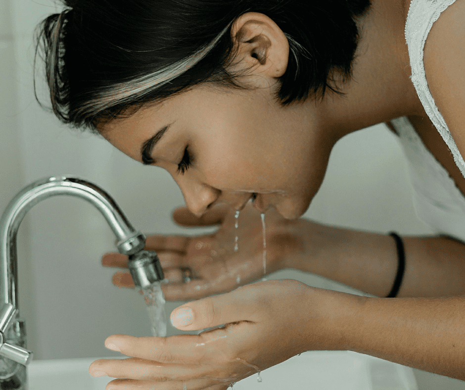 A women refreshing and pampering herself A women refreshing and pampering herself