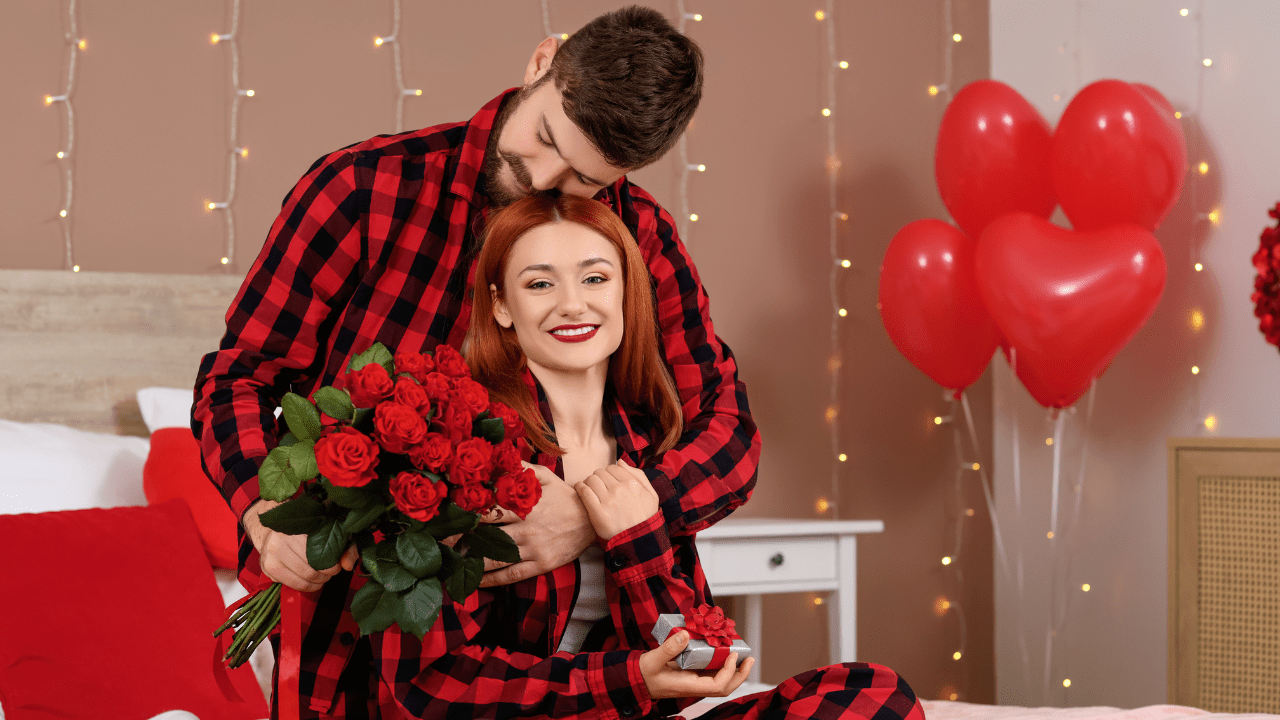 Couple celebrating Valentine at cozy home embracing realistic love and mental health