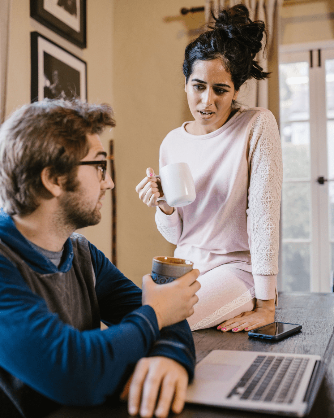 Couple discussing family conflict after a visit, highlighting relationship tension