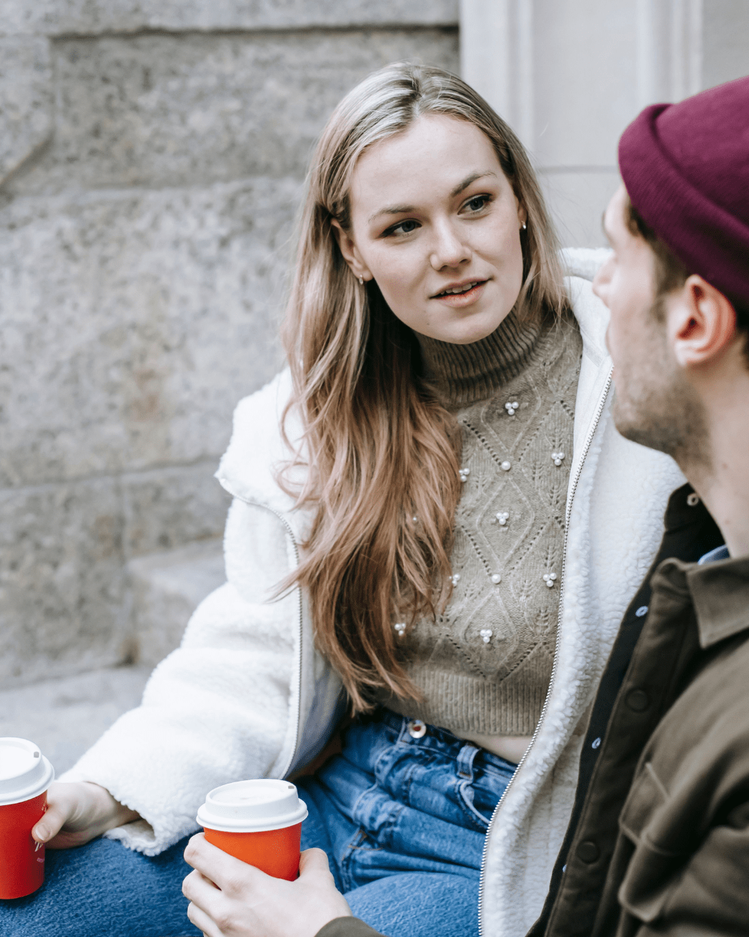 Couple talking about family boundaries over coffee