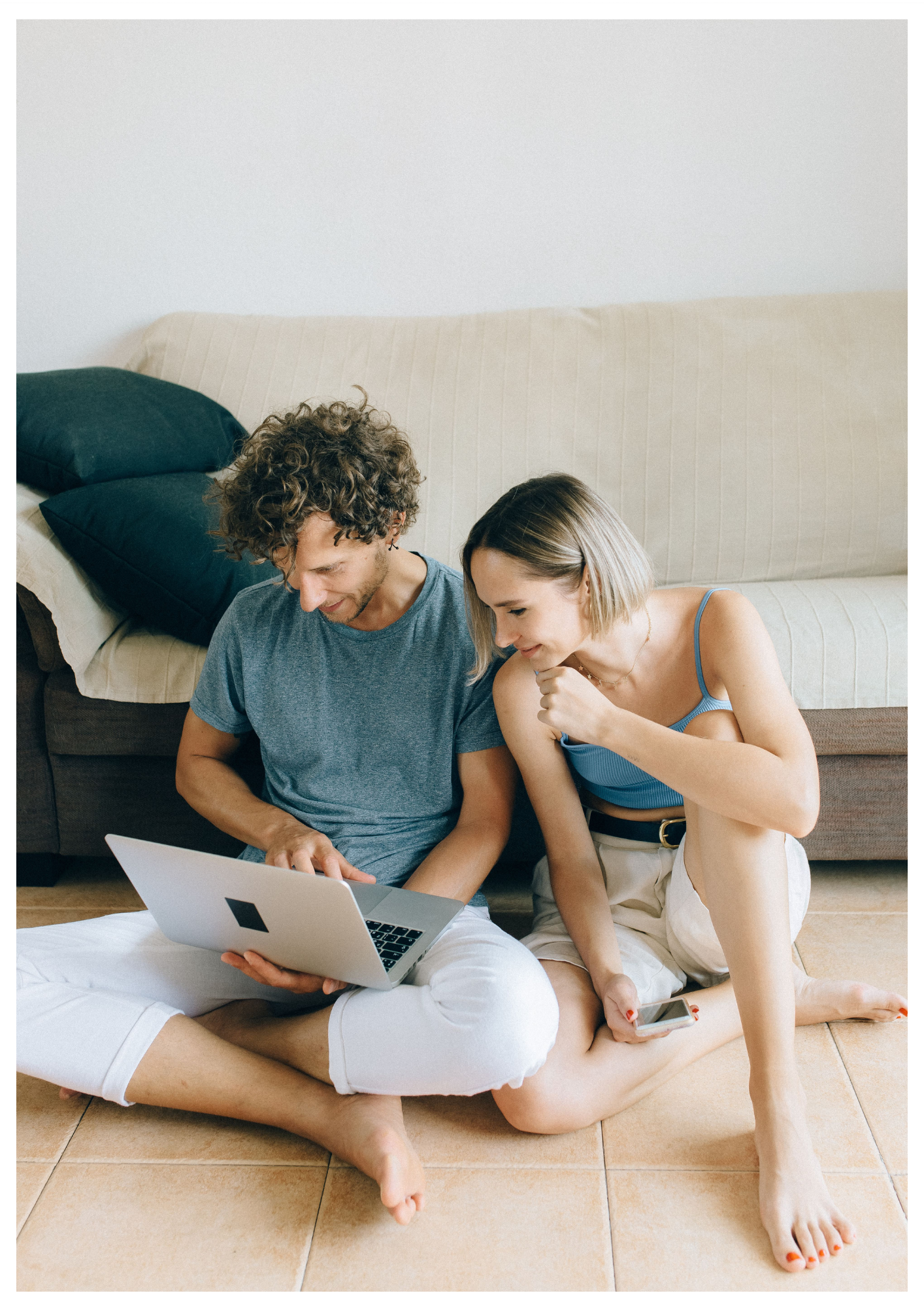 Couple completing online therapy intake paperwork at home